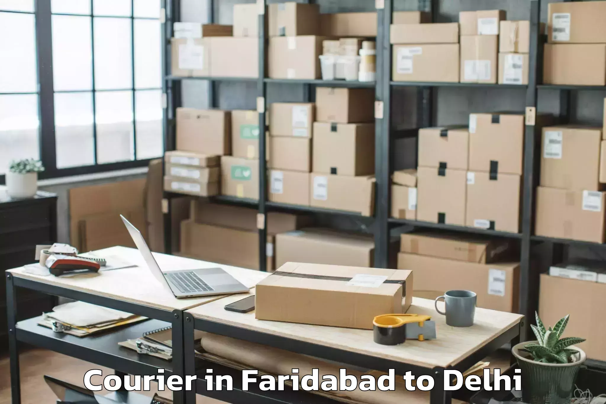 Affordable Faridabad to Unity One Janakpuri Mall Courier